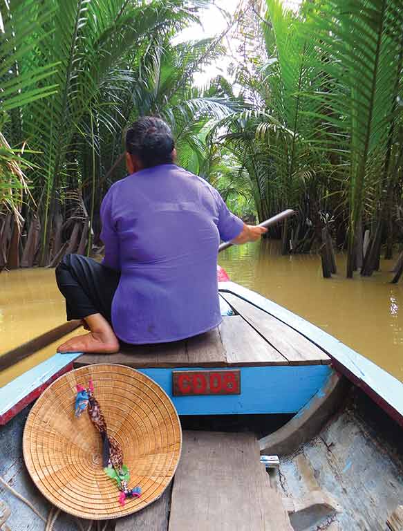 Paddling through the Mekong Delta. Photo © Dana Filek-Gibson.